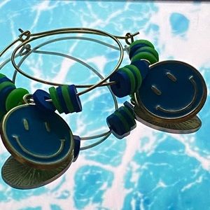 Blue and green smiley earring